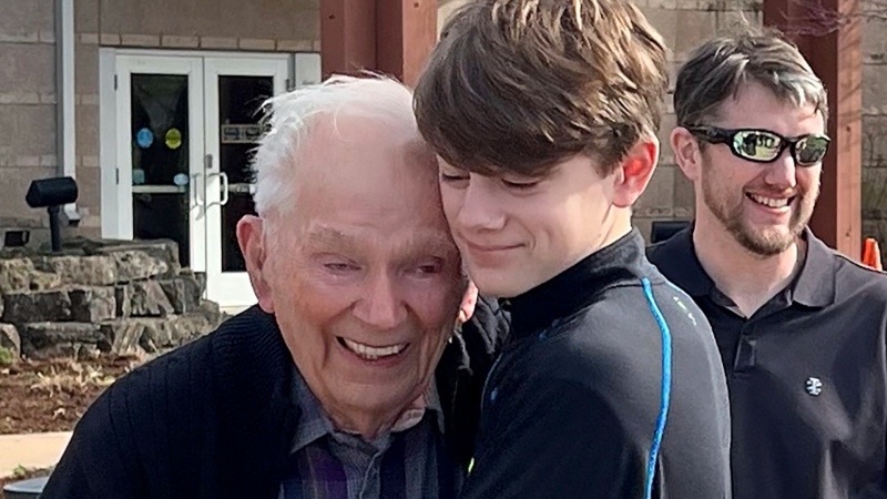 This photo provided by Linda Mitchelle shows Orville Allen of Poplar Bluff, Mo., hugging his great-grandson in March 2024. (Linda Mitchelle via AP)