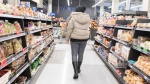 People shop at a grocery store in Montreal. Police data shows shoplifting is increasing in the city and across the country as inflation continues to rise. (Graham Hughes, The Canadian Press)