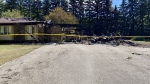 The aftermath of a house fire on Lipsett Street in the community of White City as seen on June 12, 2024. (Gareth Dillistone/CTV News)