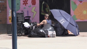 A man experiencing homelessness on the sidewalk in the Old East Village. (Daryl Newcombe/CTV News London)