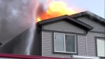 A two-alarm fire broke out Wednesday night in the southwest Calgary community of Woodbine.