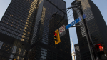 A red light on Bay Street in Canada's financial district is shown in Toronto on Wednesday, March 18, 2020. THE CANADIAN PRESS/Nathan Denette