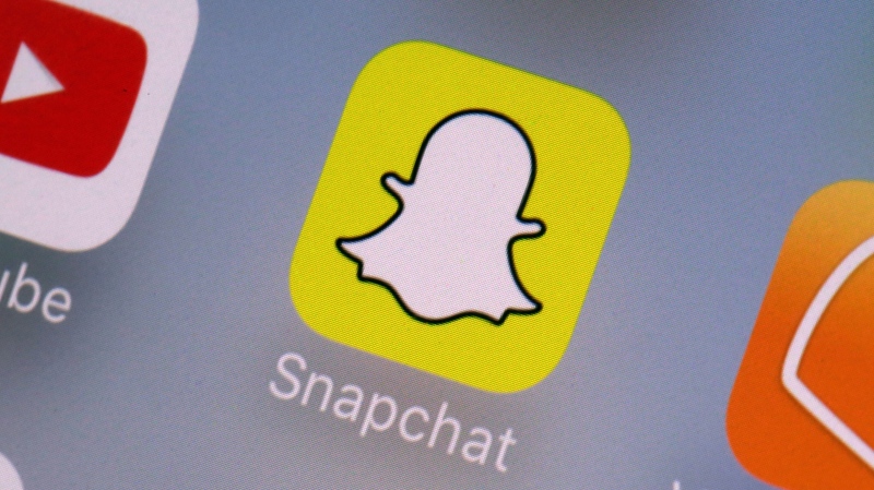 The Snapchat app appears on a mobile device in New York, Wednesday, Aug. 9, 2017. (Richard Drew / The Associated Press) 