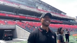 Henry Burris returns to the field at TD Place to mark the tenth anniversary of the Redblacks' franchise. July 13, 2024. (Leah Larocque/CTV News Ottawa)
