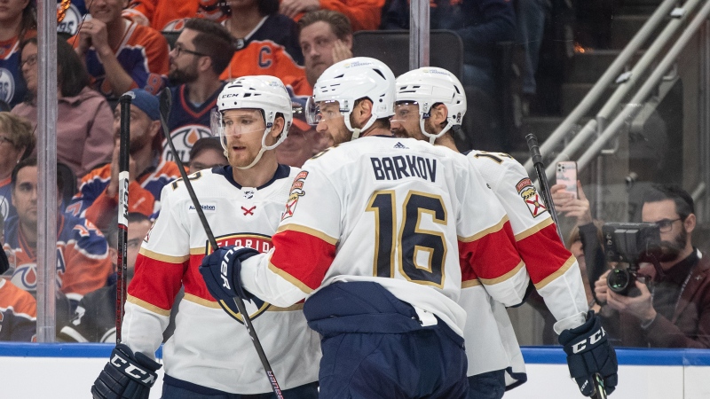 Florida Panthers' Gustav Forsling (42), Aleksander Barkov (16) and Sam Reinhart (13) celebrate a goal against the Edmonton Oilers' during first period Game 3 action of the NHL Stanley Cup final in Edmonton on Thursday, June 13, 2024.THE CANADIAN PRESS/Jason Franson