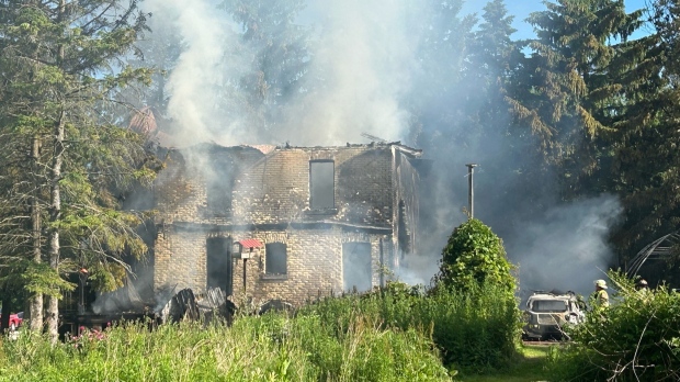 Crews are battling a structure fire at a structure on Carriage Road in Middlesex Centre on June 14, 2024. (Sean Irvine/CTV News London)