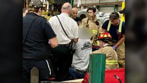 The Ottawa Paramedic Service says a worker sustained injury to his fingers after his hand got stuck in machinery at his workplace in the early hours of Friday morning in the city's east-end. (Ottawa Fire Services/ handout)