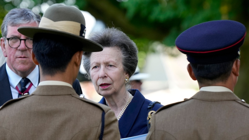 Princess Anne meets Ghurka soldiers after a commemoration service at the Bayeux cemetery on the 80th anniversary of D-Day in Bayeux, France, Wednesday, June 5, 2024.(AP Photo/Alastair Grant)
