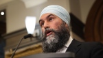 New Democratic Party Leader Jagmeet Singh speaks in the Foyer of the House of Commons on Parliament Hill in Ottawa, on Thursday, June 13, 2024. THE CANADIAN PRESS/ Patrick Doyle