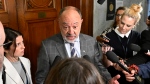 Quebec Health Minister Christian Dube responds to reporters questions over negotiations with Quebec doctors, Tuesday, May 28, 2024 at the legislature in Quebec City. (Jacques Boissinot, The Canadian Press)