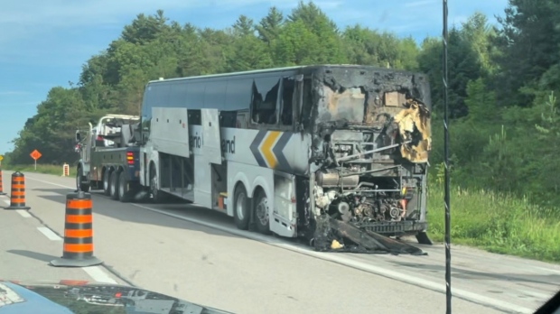 An Ontario Northland bus caught on fire on Highway 400 in Severn Township on Sunday, June 16, 2024 (supplied). 