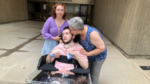 Tristan Roby is seen with his mother, Abby Roby and sister, MacKenzie Azevedo outside the London courthouse on June 18, 2024. (Nick Paparella/CTV News London)