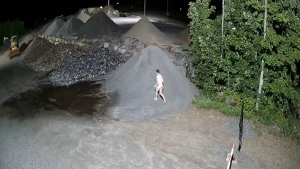 Caught on camera: Nude man runs through gravel pit