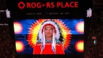A First Nations land recognition video narrated by Chief Willie Littlechild plays on video screens before Game 3 of the Stanley Cup Final on June 13, 2024, at Edmonton's Rogers Place. The Edmonton Oilers began airing the video before national anthems in 2021. (Stephen Whyno/Associated Press)