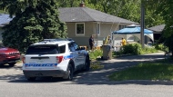 An lone officer on the scene of a knife offence on the 4100 block of 17th Avenue on June 20, 2024. (David Prisciak/CTV News)