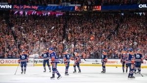 Edmonton Oilers players celebrate the win over the Florida Panthers following Game 6 action of the NHL Stanley Cup final in Edmonton on Friday, June 21, 2024.THE CANADIAN PRESS/Jason Franson