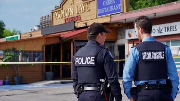 Police on scene where a fire took a man's life on June 22, 2024. (Simon Sheehan / CP24) 
