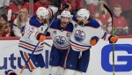 Edmonton Oilers' Connor McDavid celebrates during the Stanley Cup Finals against the Florida Panthers in Sunrise, Fla.  (AP Photo/Rebecca Blackwell)