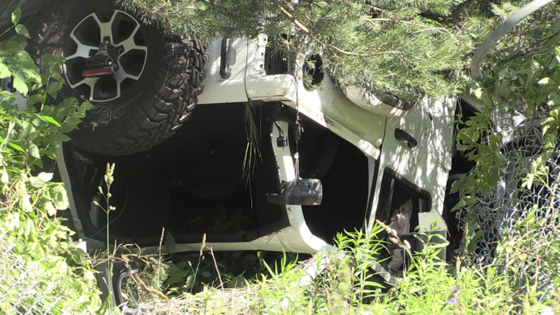 A vehicle landed upside down in the bush near Essa Road and Salem Road in the south end of Barrie, Ont., on Mon., June 24, 2024. (CTV News/Rob Cooper)