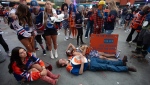 Edmonton Oilers fans react to the loss against the Florida Panthers in game 7 of the NHL Stanley Cup final, in Edmonton on Monday June 24, 2024. THE CANADIAN PRESS/Jason Franson