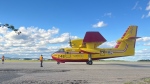 A Quebec water bomber, shown here in this handout photo from Thursday, June 20, 2024, sits at the Happy Valley-Goose Bay airport, ready to help battle wildfires in central Labrador. (HO-Hunter Wilson / The Canadian Press)