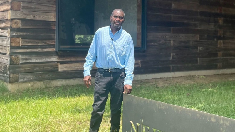 Patrick Braxton by the Newbern Town Hall, a building he says he's been locked out of. (Meridith Edwards/CNN Newsource)