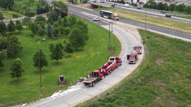 Police responded to a truck rollover on the E.C. Row Expressway westbound off ramp at Dougall Avenue on Wednesday, June 26, 2024. (Bob Bellacicco/CTV News Windsor)