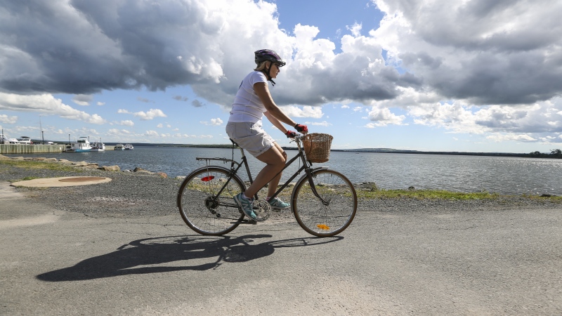 A woman riding a bicycle is seen in this file image. (Courtesy: Communications Nova Scotia)
