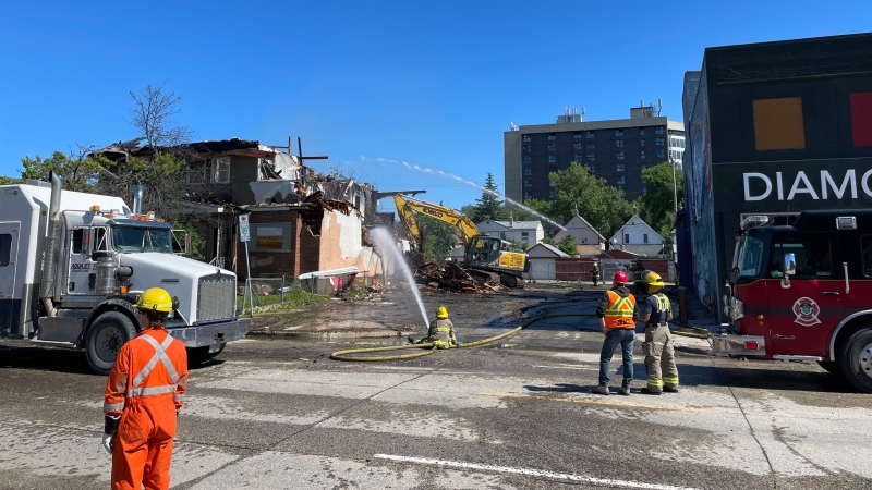 Winnipeg Fire Paramedic Service (WFPS) crews battle a blaze in the 400 block of William Avenue on Sunday, June 30, 2024. (Alexandra Holyk/CTV News Winnipeg)