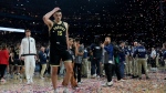 Purdue center Zach Edey (15) leaves the courier their loss against UConn in the NCAA college Final Four championship basketball game, Monday, April 8, 2024, in Glendale, Ariz. (The Canadian Press/AP-David J. Phillip)