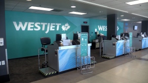 With two flights canceled on Monday July 1, 2024, the WestJet counter at London International Airport is dark (Source: Brent Lale/CTV News London)