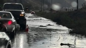 The B.C. Ministry of Transportation and Infrastructure closed a section of the Trans-Canada Highway through Savona in both directions Sunday night due to the flooding. (Facebook/Ashcroft Live)