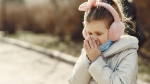 A stock photo of a young person coughing. (Photo by Gustavo Fring/Unsplash)