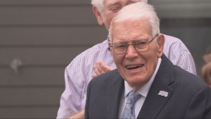Richard Earl is seen smiling moments after a CC-130H Hercules flew over where he lived to mark his 100th birthday on July 3, 2024. (Jamie Dowsett/CTV News Winnipeg)