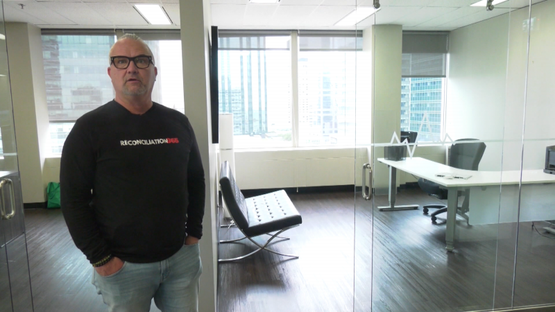 CommAlert Tim Carwell in his company's downtown Edmonton office space. (Nav Sangha/CTV News Edmonton)