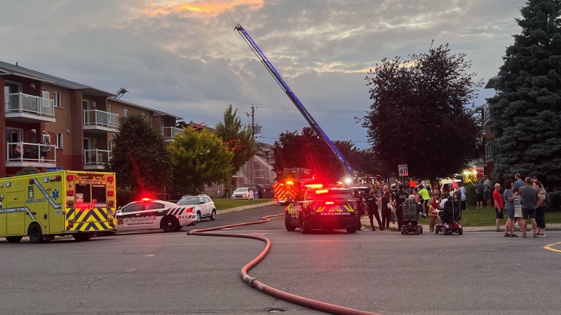 Six families were forced out of their homes after a fire ignited in their condo building in Longueuil. (Cosmo Santamaria/CTV News)