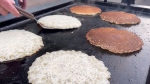 The First Flip pancake breakfast on Stephen Avenue marks the beginning of Stampede season for many Calgarians. (File)