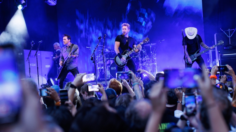 FILE: Nickelback performs during the Toronto International Film Festival on Friday, Sept. 8, 2023. THE CANADIAN PRESS/Cole Burston