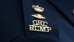 The RCMP logo is seen on the shoulder of a superintendent on June 24, 2023 in St. John’s, Nfld. THE CANADIAN PRESS/Adrian Wyld 