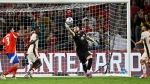 Canada goalkeeper Maxime Crepeau (16) makes a save against Chile during the second half of a Copa America Group A soccer match, Saturday, June 29, 2024, in Orlando, Fla. (Phelan M. Ebenhack, The Associated Press)
