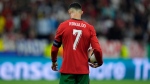 Portugal's Cristiano Ronaldo prepares to kick a penalty during a round of sixteen match between Portugal and Slovenia at the Euro 2024 soccer tournament in Frankfurt, Germany, Monday, July 1, 2024. (Matthias Schrader / AP Photo, File)