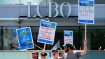 Workers for Ontario's main liquor retailer will hold a rally in downtown Toronto today, marking the second day of their historic strike. Liquor Control Board of Ontario (LCBO) employees picket  in front of a close LCBO store in downtown Ottawa on Friday, July 5, 2024. THE CANADIAN PRESS/Sean Kilpatrick