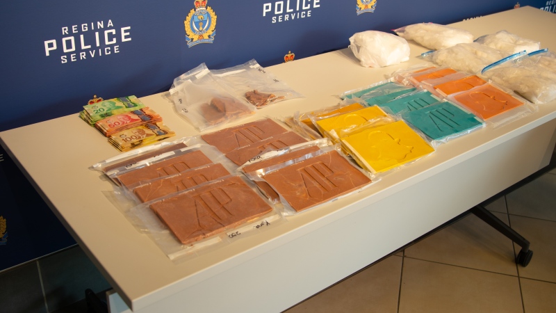 Approximately 6 kilograms of fentanyl, over 5 kilograms of methamphetamine, nearly 1 kilogram of cocaine, and approximately $14,000 in cash were seized in the bust. (Courtesy: Regina police)
