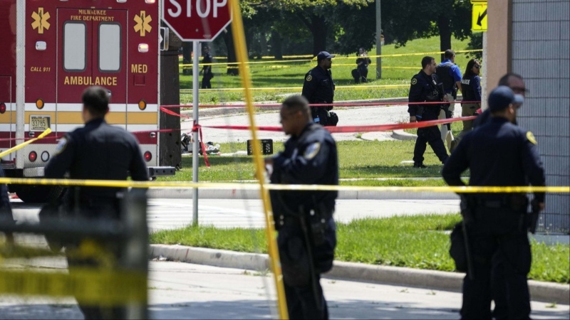 Police investigate a shooting near King Park during the second day of the 2024 Republican National Convention, July 16, 2024, in Milwaukee. (AP Photo/Alex Brandon)