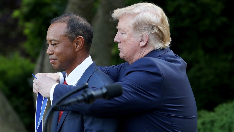 Donald Trump is pictured presenting Woods with the Medal of Freedom after his Masters victory in 2019. (Win McNamee / Getty Images via CNN Newsource)