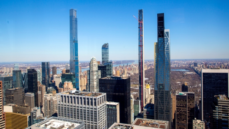 From left, Central Park Tower, One57, Steinway Tower (under construction) and the MoMA Expansion Tower, four residential skyscrapers tower over the skyline south of Central Park in the Manhattan borough of New York City on February 26, 2021. AP, Ted Shaffrey 