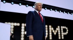 Republican presidential candidate former U.S. president Donald Trump is introduced during the final night of the Republican National Convention, July 18, 2024, in Milwaukee. (AP Photo/Evan Vucci)
