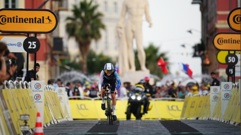 Canada's Derek Gee speeds to the finish line of the twenty-first stage of the Tour de France cycling race, an individual time trial over 33.7 kilometers (20.9 miles) with start in Monaco and finish in Nice, France, Sunday, July 21, 2024. (AP Photo/Daniel Cole)