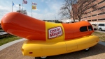 FILE - The Oscar Mayer Wienermobile sits outside the the Oscar Meyer headquarters, Oct. 27, 2014, in Madison, Wis. (M.P. King/Wisconsin State Journal via AP, File)