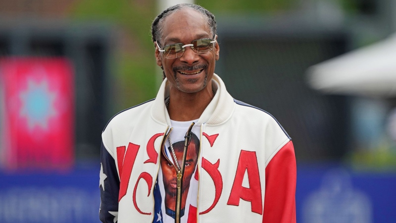 Snoop Dogg will be one of the final torchbearers of the Olympic flame ahead of the Games’ Opening Ceremony in Paris on July 26. (Kirby Lee / USA TODAY Sports / Reuters via CNN Newsource)